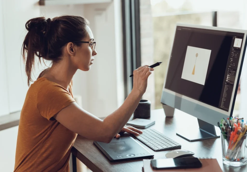 Creative staff working at her workstation